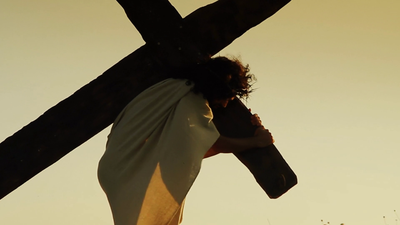Jesus carries the cross