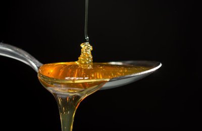Honey on spoon